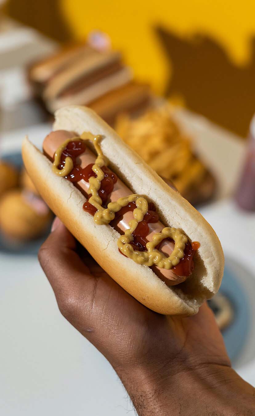 Hotdog with mustard in a bun